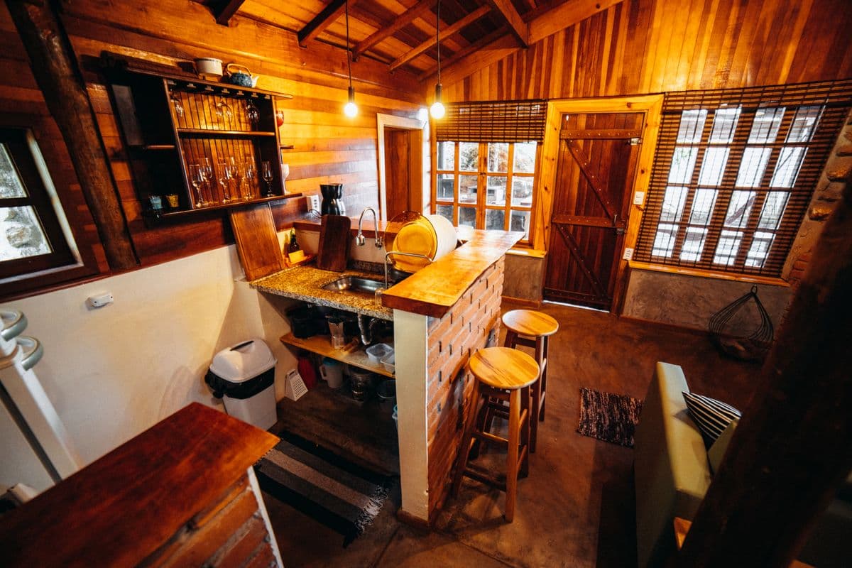a cozy, well-furnished small home interior with warm lighting and minimal clutter
