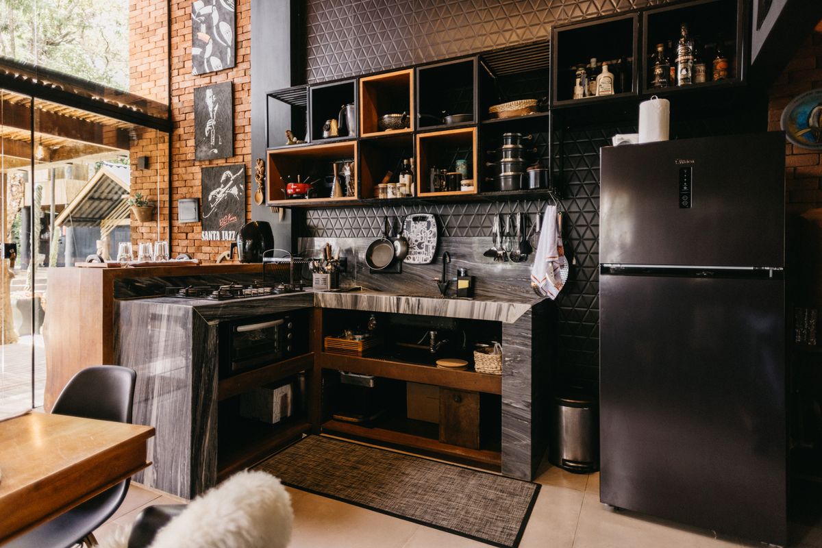 a compact modern kitchen with efficient cabinet storage and a clean design